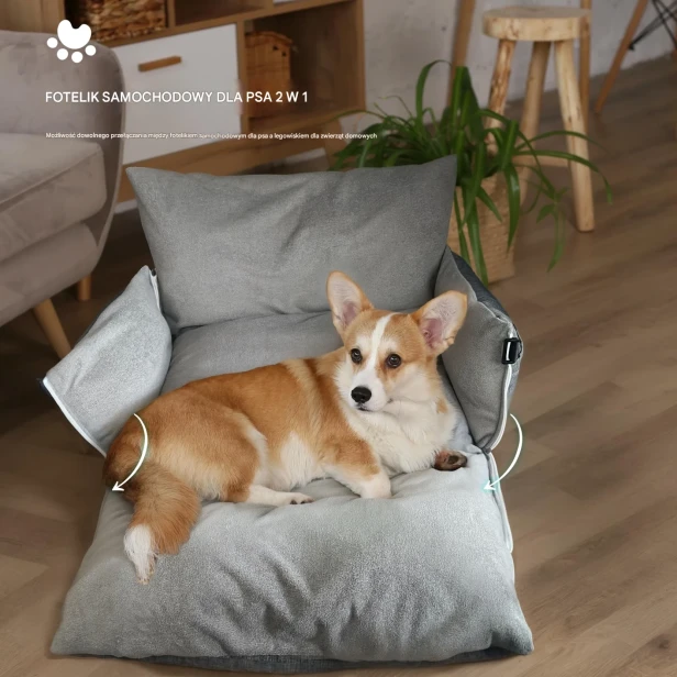 Pies rasy Corgi leżący w Luksusowym Bezpiecznym Foteliku Samochodowym dla Psa.