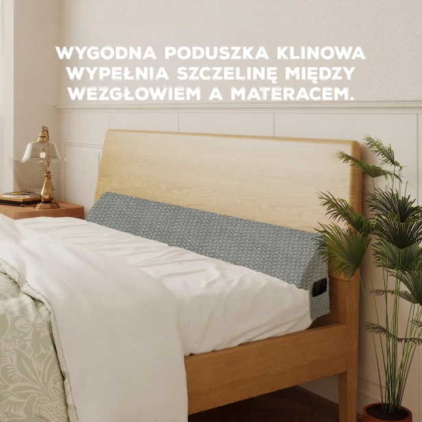 Poduszka Klinowa XXL Szara, aranżacja na łóżku w sypialni.