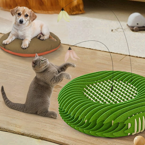 kot bawiący się zabawką przymocowaną do Legowisko Filcowe DIY dla Zwierzaka